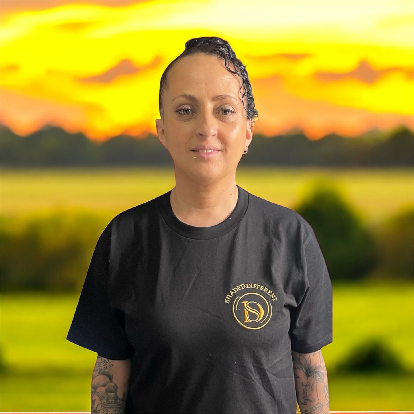 Womens black t-shirt with gold embroidery logo